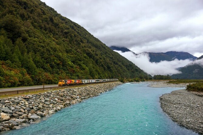 TranzAlpine scenic train travelling through the Southern Alps of New Zealand