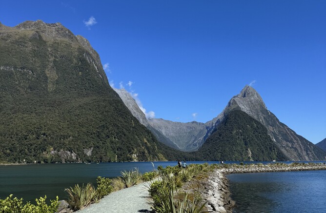 Scenic view of Fiordland’s dramatic mountains and deep fjords in New Zealand