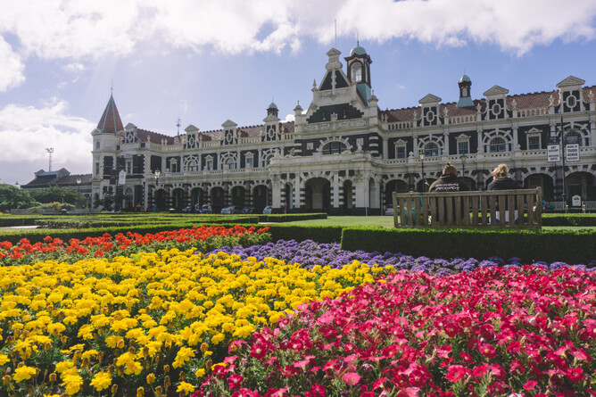 Historic Dunedin Railway Station with ornate architecture in Otago, New Zealand