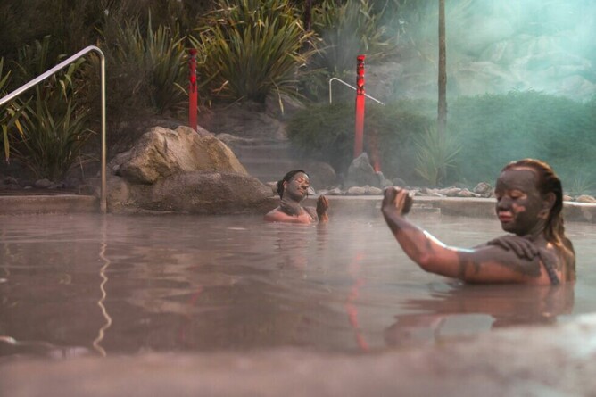 Vibrant natural hot springs with steaming mineral pools in Rotorua, New Zealand