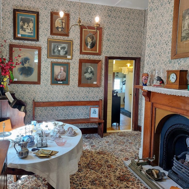 Photo gallery and table setting in the Martinborough Museum