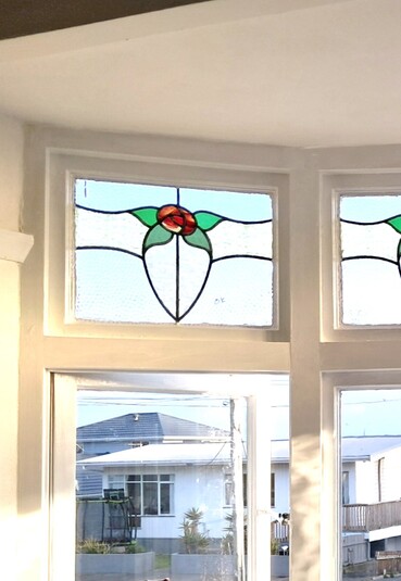 Stained glass windows in white room