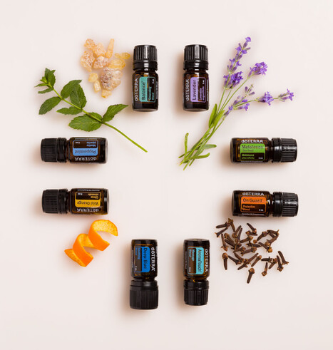 A picture of 8 doTERRA Essential oils used in the Aromatouch Technique massage