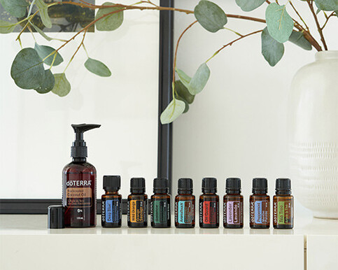 Picture of the 8 essential oils plus the coconut oil for the aromatouch technique