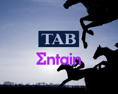 Horse racing scene with Entain TAB branding supported by Advanced Safety on ISO 45001 health and safety journey.