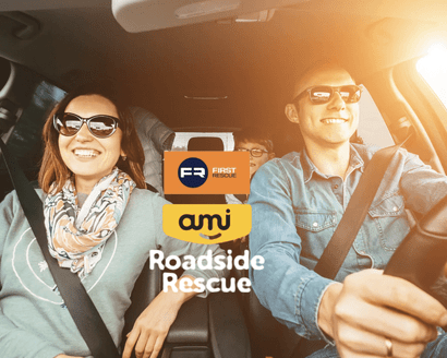 Smiling family in car representing First Rescue roadside services partnered with Advanced Safety for Tōtika certification