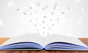 Book with words jumping off page.