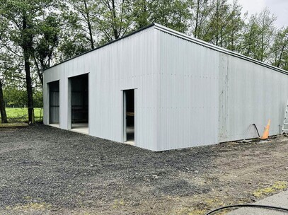 Fully enclosed pole shed with new roller doors and PA door  Canterbury
