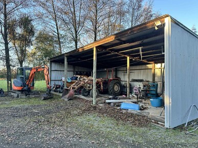 Old corrugated iron shed before alteration and concrete prep Canterbury