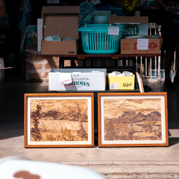 two framed pieces of art