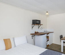 Cabin 8 bed and kitchenette