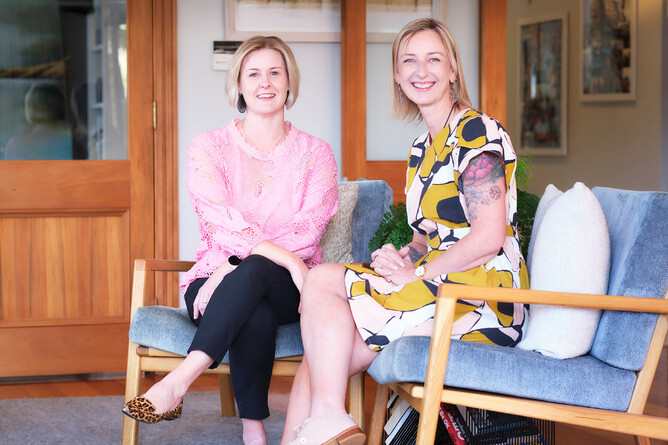 Photo of Claire and Gabe sitting together