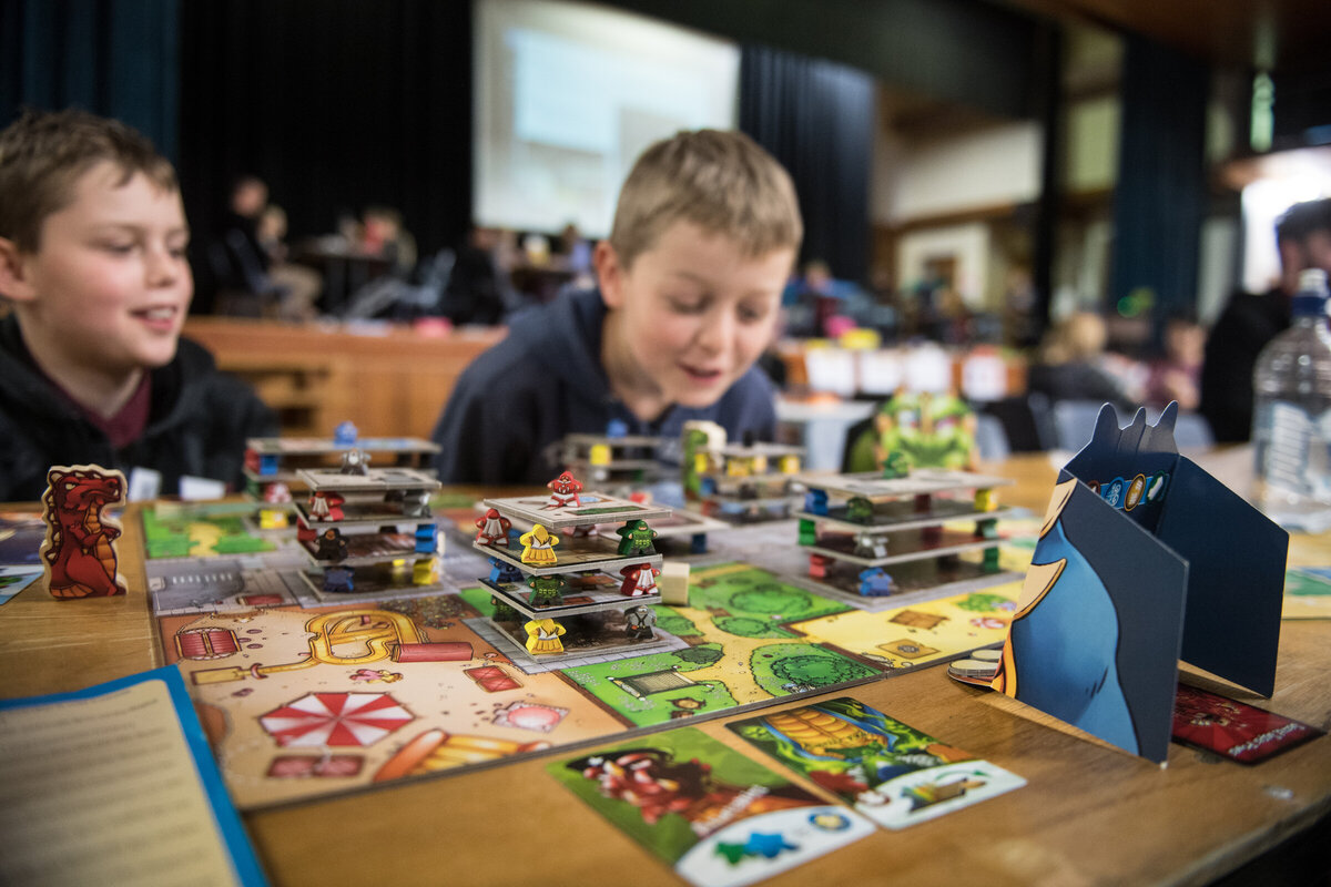 People Playing Board Games: rs