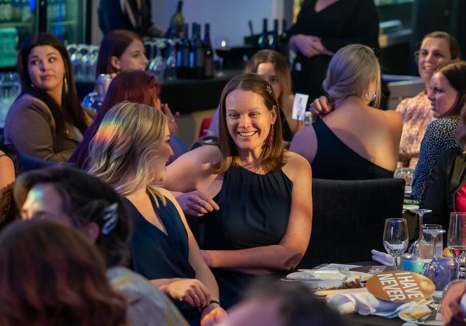 Event guests talking and laughing at their tables at the Virtual Assistant Awards in Hamilton, New Zealand.