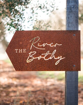 Unwind in Northland accommodation | Tucked in an olive grove, relax in a hammock outdoors