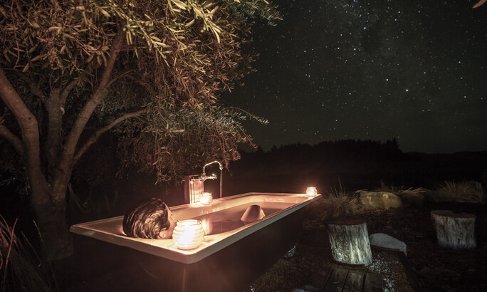 Unwind in Northland accommodation | Tucked in an olive grove, relax in a hammock outdoors