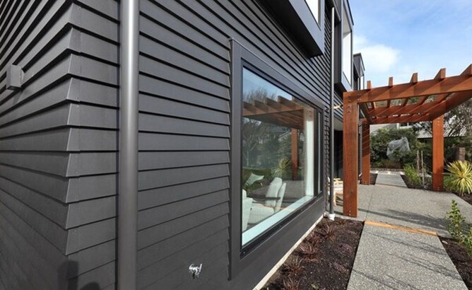 This house features vinyl weatherboards, otherwise known as UPVC cladding.