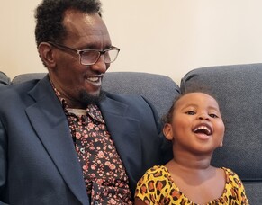 Miles of smiles for former refugee