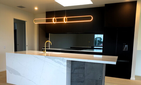 Open-plan kitchen layout, designed for living and entertaining by Barrett Joinery.