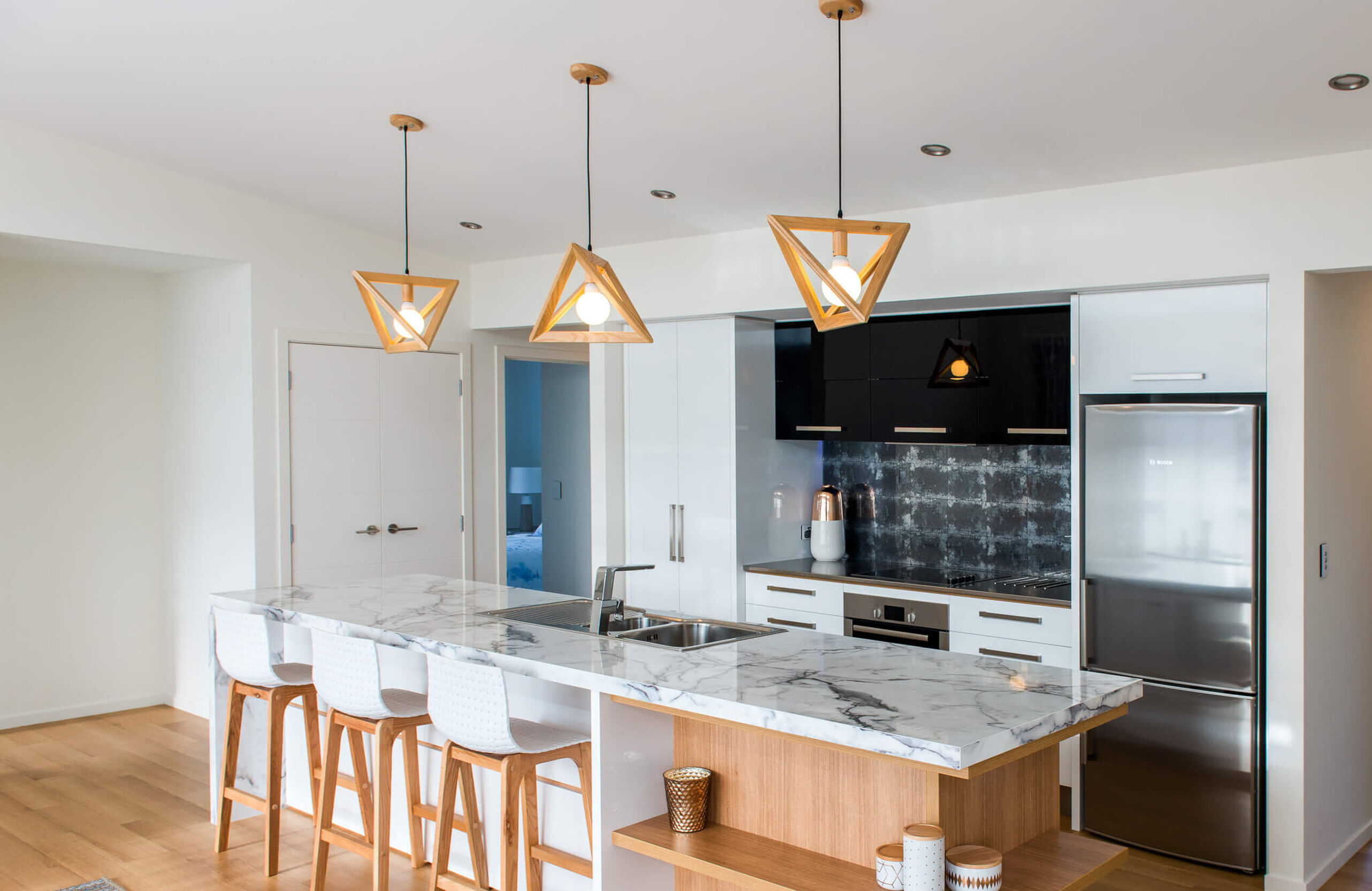 Custom kitchen installation in Timaru featuring modern cabinetry and premium appliances, designed for functionality and style.