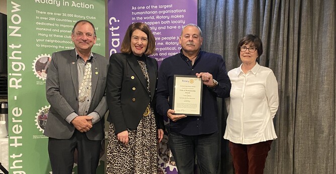 Valued BBBS Volunteer Lance Jefferys receiving his Pride of Workmanship Award;  BBBS Team Member Patricia Small being presented with her Pride of Workmanship Award.