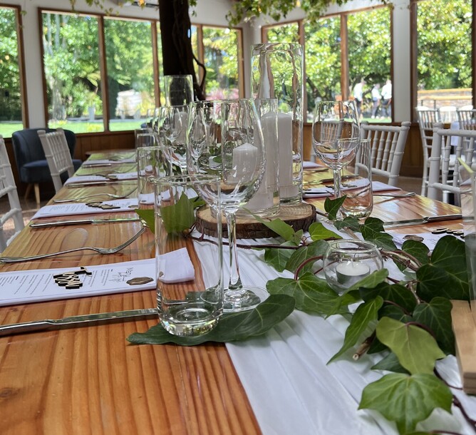 simple wedding table set-up decorated with leaves