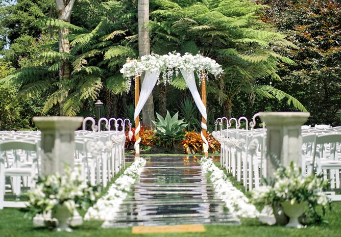 Wedding ceremony setup at The Palms at Markovina Estate in Kumeu