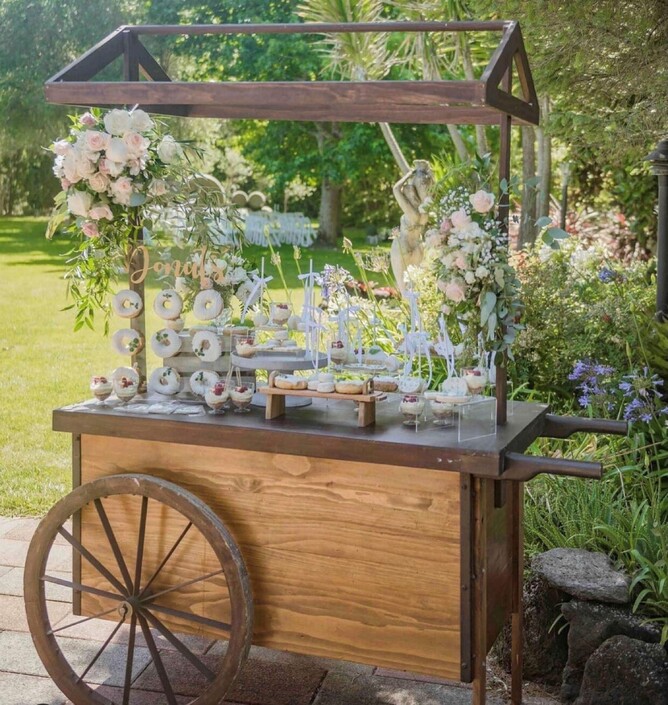 Lolly cart wedding favours with donuts and other sweet treats
