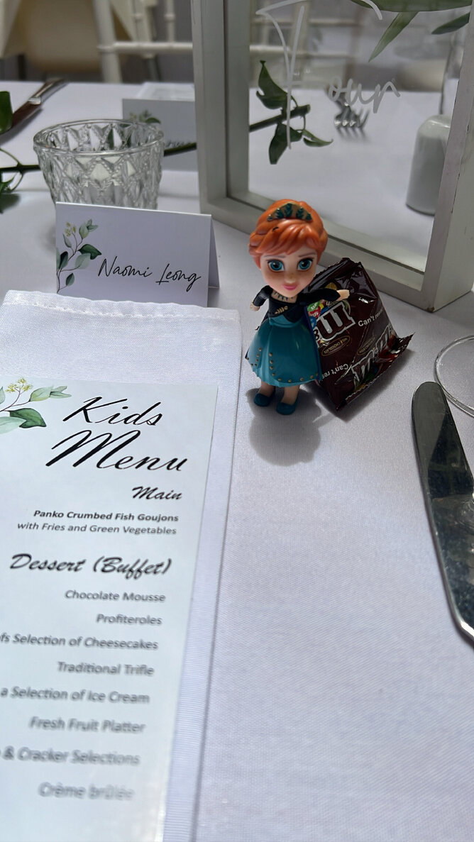 Anna from Frozen bobblehead near Kids menu