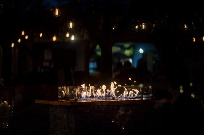 Outdoor firepit at night at Markovina Vineyard Estate in Kumeu