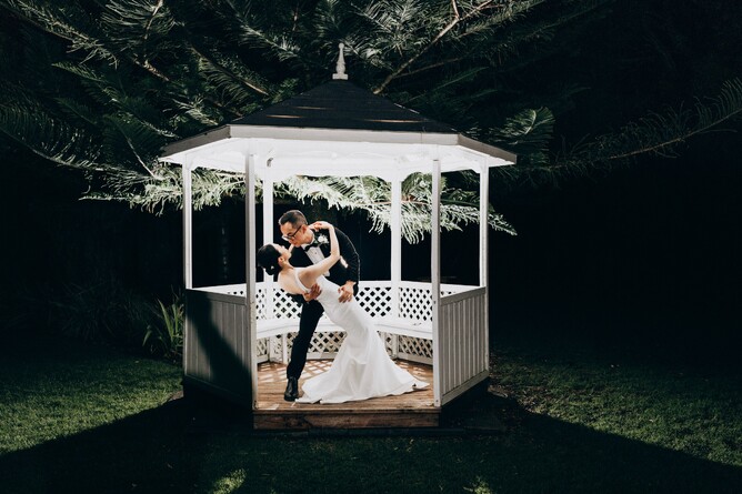 Night time wedding photo at The Pergola at Markovina Estate in Kumeu, Auckland