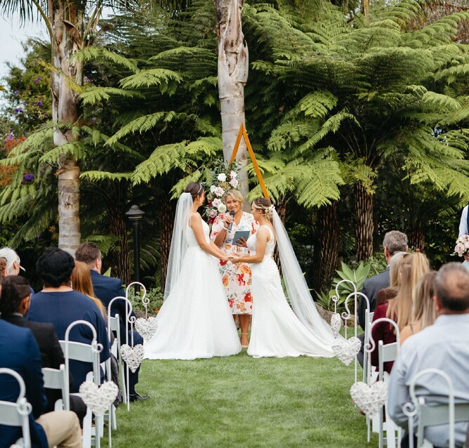 Same sex wedding ceremony at The Palms at Markovina Estate in Kumeu