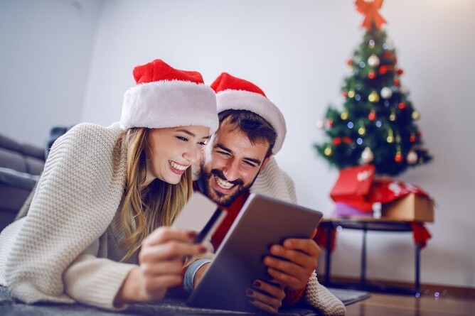 happy couple in Santa hats