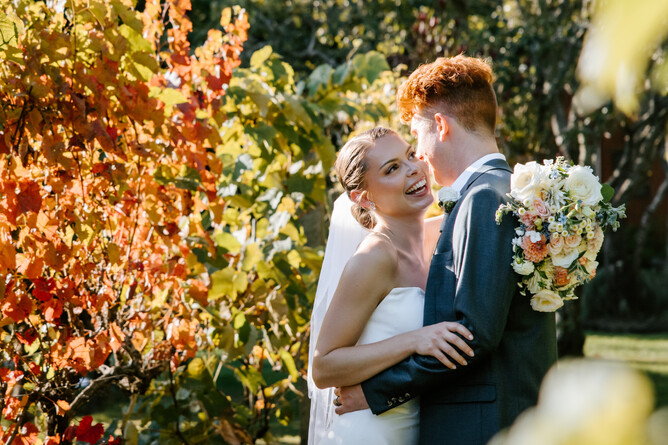 Markovina Estate Wedding Venue Couple in Vines