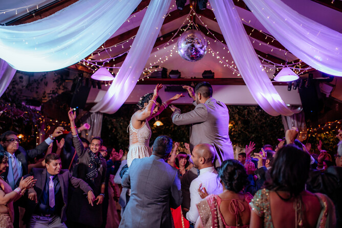 Wedding guests dancing during the reception at Markovina Estate in Kumeu