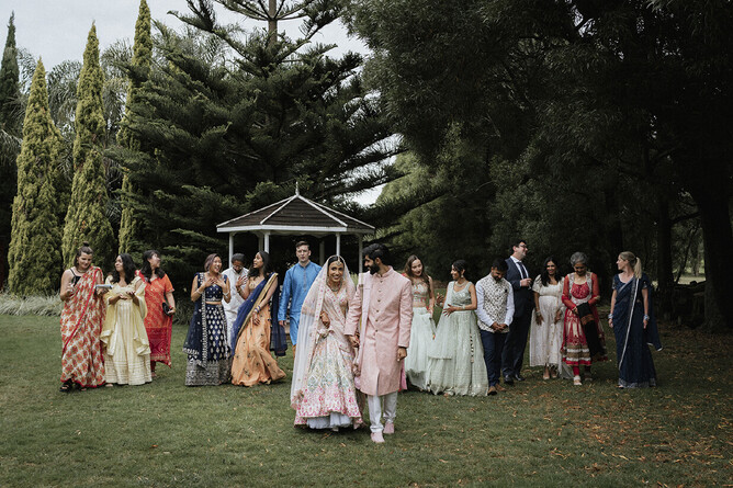 wedding couple with guests