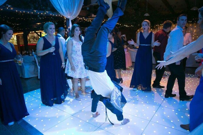 Wedding guests dancing during the reception at Markovina Estate in Kumeu