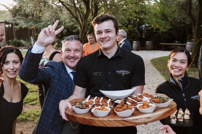 Markovina staff serving canapes during a wedding at Markovina Estate in Kumeu