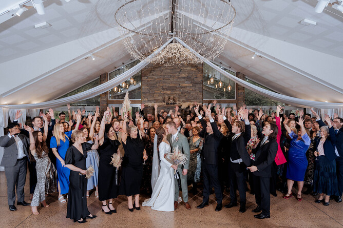 Wet Weather Indoor Fireplace Group Photo at Markovina Vineyard Estate in Kumeu