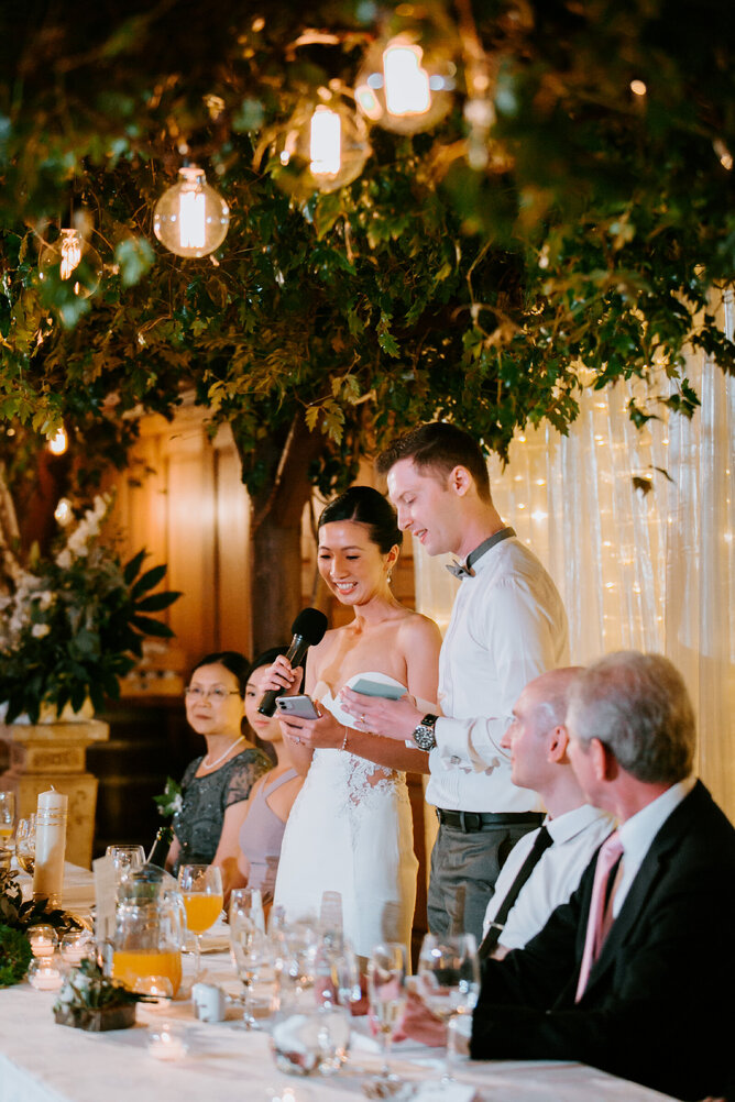 Wedding speeches under the vines at Markovina Estate in Kumeu, Auckland