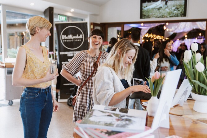 Guests viewing the wedding venue during the open day at Markovina Estate in Kumeu