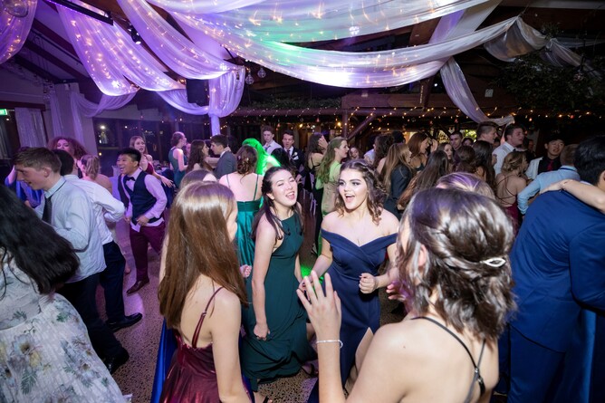 Attendees dancing during school ball at Markovina Vineyard Estate in Kumeu