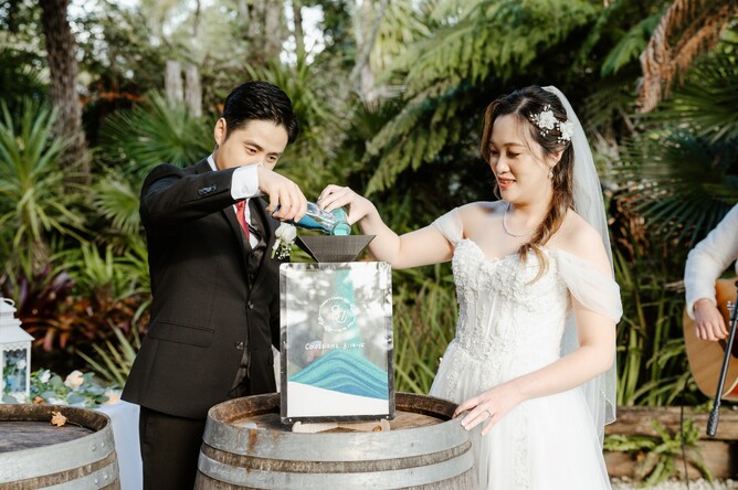 Unique wedding ceremony tradition at The Barrel Waterfall at Markovina Estate in Kumeu, Auckland