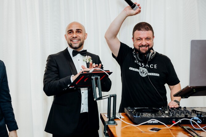 DJ playing music during the wedding reception at Markovina Estate in Kumeu