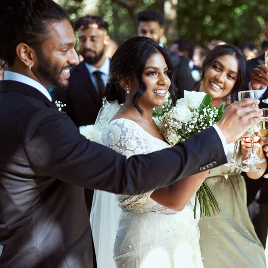 Bride and Groom with Champagne