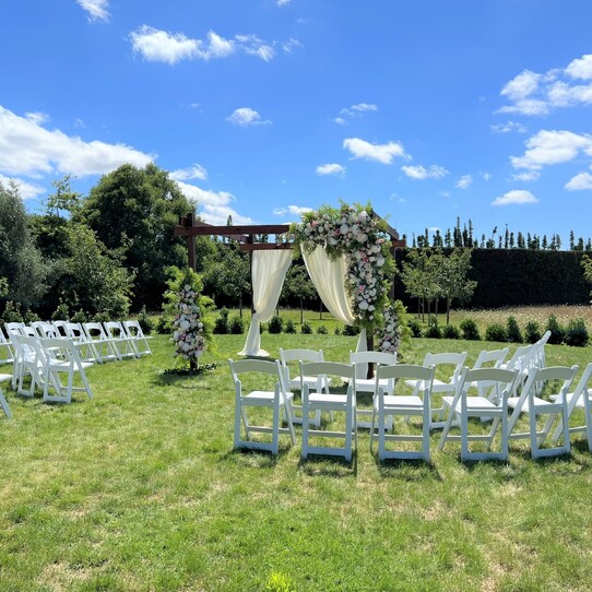 Cherry Blossom Round Wedding Ceremony with Halfmoon Seating