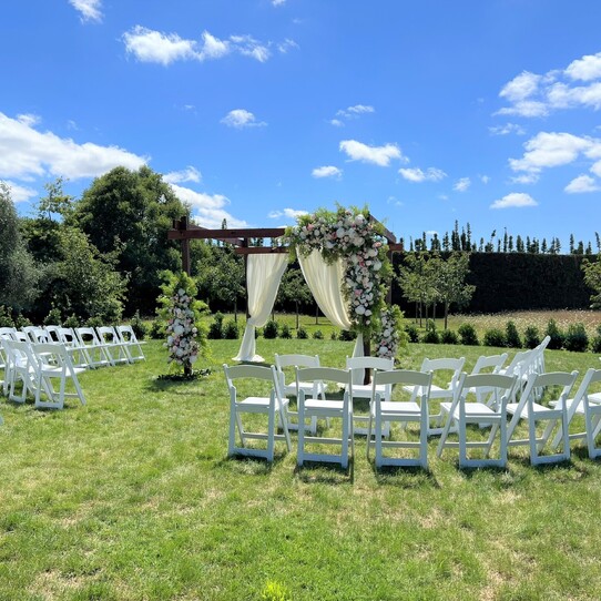 Cherry Blossom Round Wedding Ceremony with Halfmoon Seating