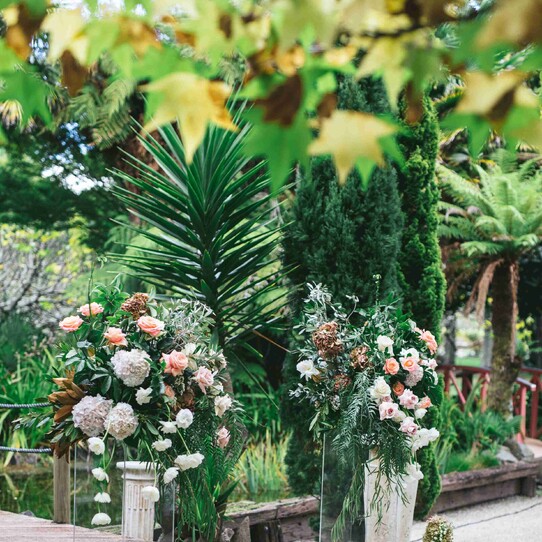 Florals on Plinths at Barrel Waterfall Wedding Ceremony