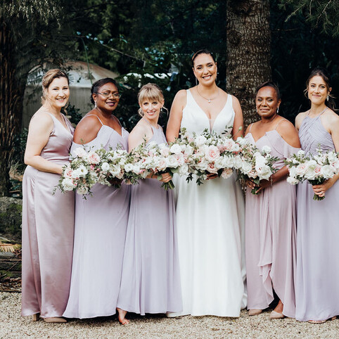 bride and bridesmate posing