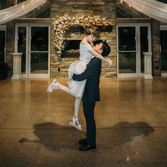 Bride & Groom First Dance infront of the Stone Fireplace